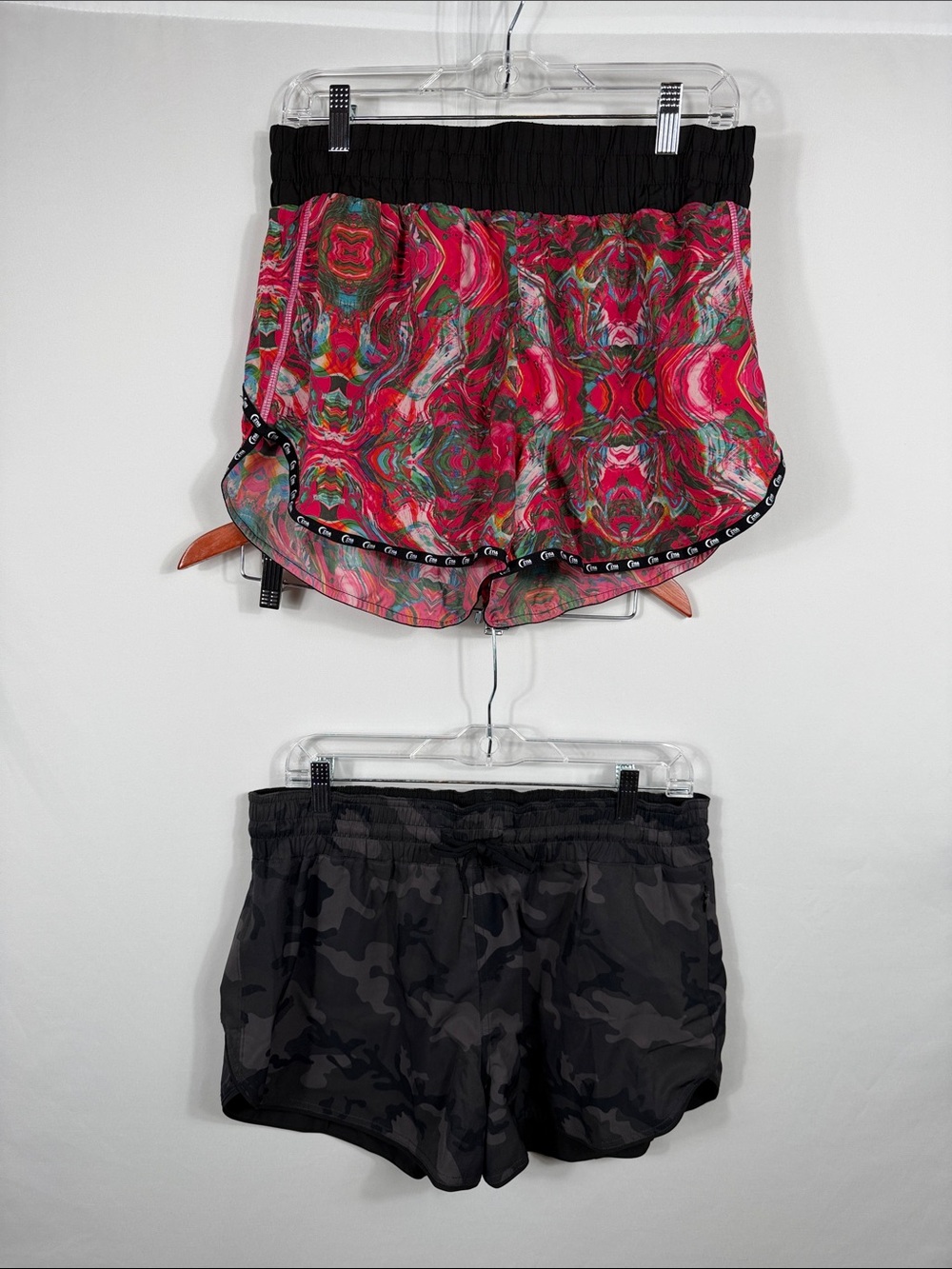 ZYIA Set of 2 Athletic Shorts. Camo shorts are reversible Pink has liner. Size L